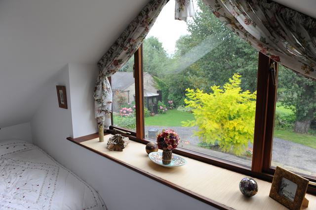 triangular dormer in hard wood loft conversion in barn 